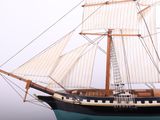 a small model of a boat on a table
