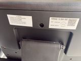 a close up of a tv screen with a remote control