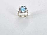 a blue topaz stone and diamond ring