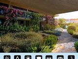 a picture of a house that has a canopy over it
