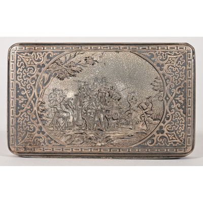 an antique silver metal box with a scene of a man and a woman in a landscape