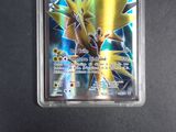 a close up of a pokemon trading card in a plastic holder
