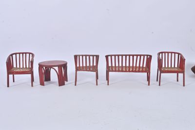 four chairs and a table in a row on a white background