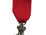 l'image d'une médaille portant une étoile