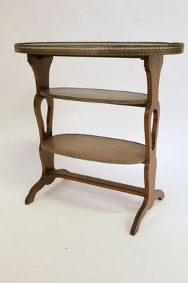 a small table with a shelf on top of it