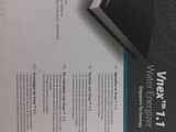 the back of a black and white book sitting on top of a table