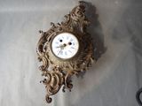 a clock that is hanging on the wall in the room