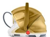 un casque doré orné d'un bouton rouge