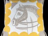 yellow and grey horse pillow with yellow dots on it