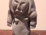 a statue of a bear that is on a table