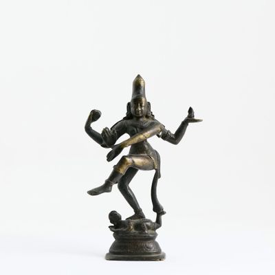 an image of a bronze statue of a man holding a sword