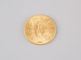 an image of a gold coin on a white surface