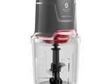 the blender is black and red with a red handle
