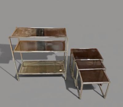 two tables that are next to each other on a gray surface