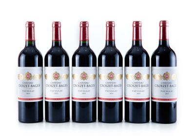 six bottles of red wine lined up in a row