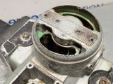 a close up of a metal object with a hole in it