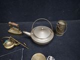 a tea pot, tea kettle, and other items on a table