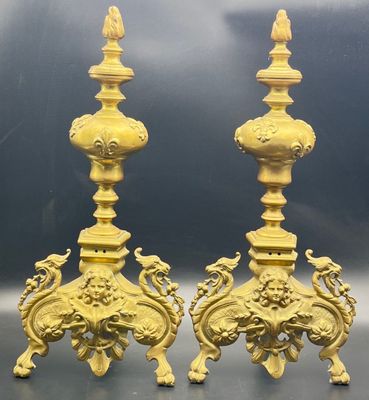 pair of antique brass candlesticks with birds and flowers