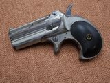 a gun that is laying on the ground