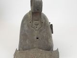 an old helmet on a white surface with a white background