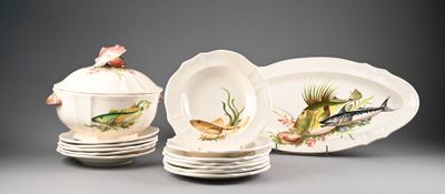 three plates and a bowl with fish on them