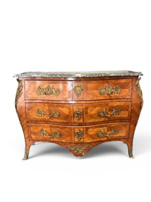 an image of a chest of drawers with marble top