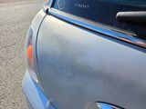 a car that has a sticker on the side of it