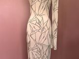 une robe blanche sur un mannequin mannequin mannequin mannequin mannequin mannequin mannequin mannequin mannequin mannequin