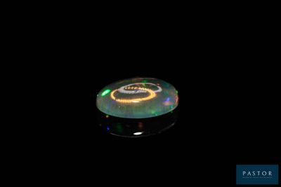 an image of a glowing disc in the dark