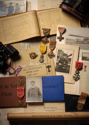 a lot of old books and other items on the table