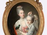 portrait d'une femme et d'un enfant dans un cadre doré