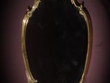 a mirror that is sitting on the wall