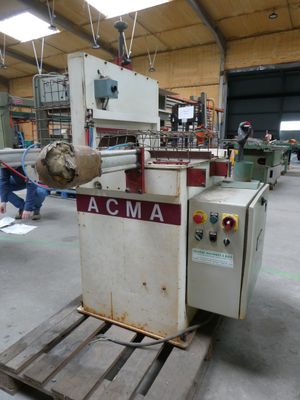 a machine that is sitting on a pallet in a warehouse
