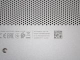 the back of a silver laptop computer with a metal cover