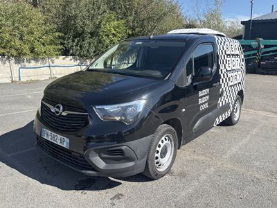 a black van that is parked in a parking lot