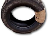 an image of a tire with a piece of paper on it