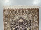 a person standing on a rug with their feet on the floor