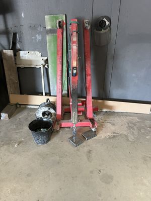 a picture of a garage with tools on the floor