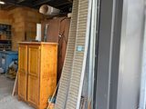 a garage with a lot of furniture inside of it