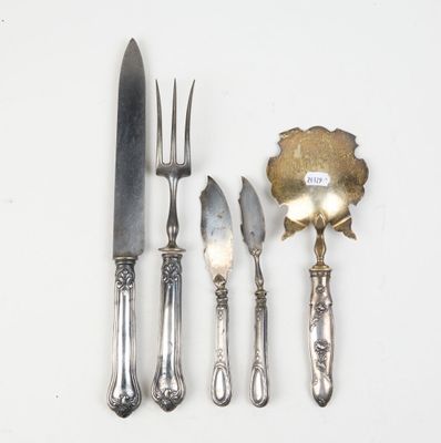 a silver plate with a knife, fork, and spoon on it