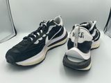 black and white nike air max sneakers on a white surface
