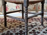 a small table with a basket on top of it