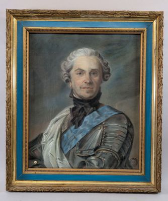 portrait of a man in armor in a blue and gold frame