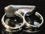 two rings that are sitting on top of a table