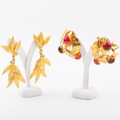 three pairs of gold - plated earrings with leaves and berries