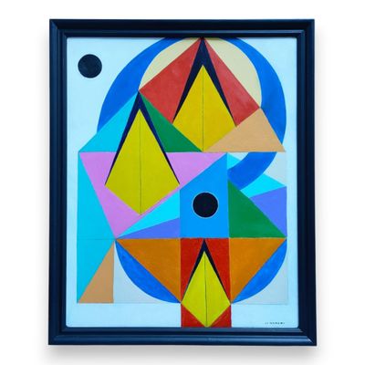 un tableau représentant un motif géométrique coloré, dans un cadre noir