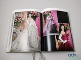 an open book with a picture of a woman in a wedding dress