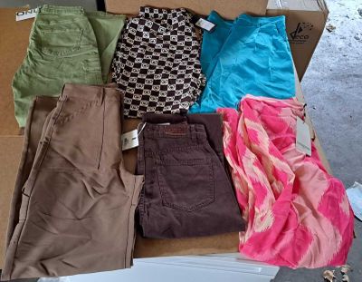 a box full of clothes that is sitting on a table