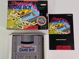two games on the table and one is a nintendo game boy