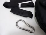 a black bag with a metal carabine and a metal carabine